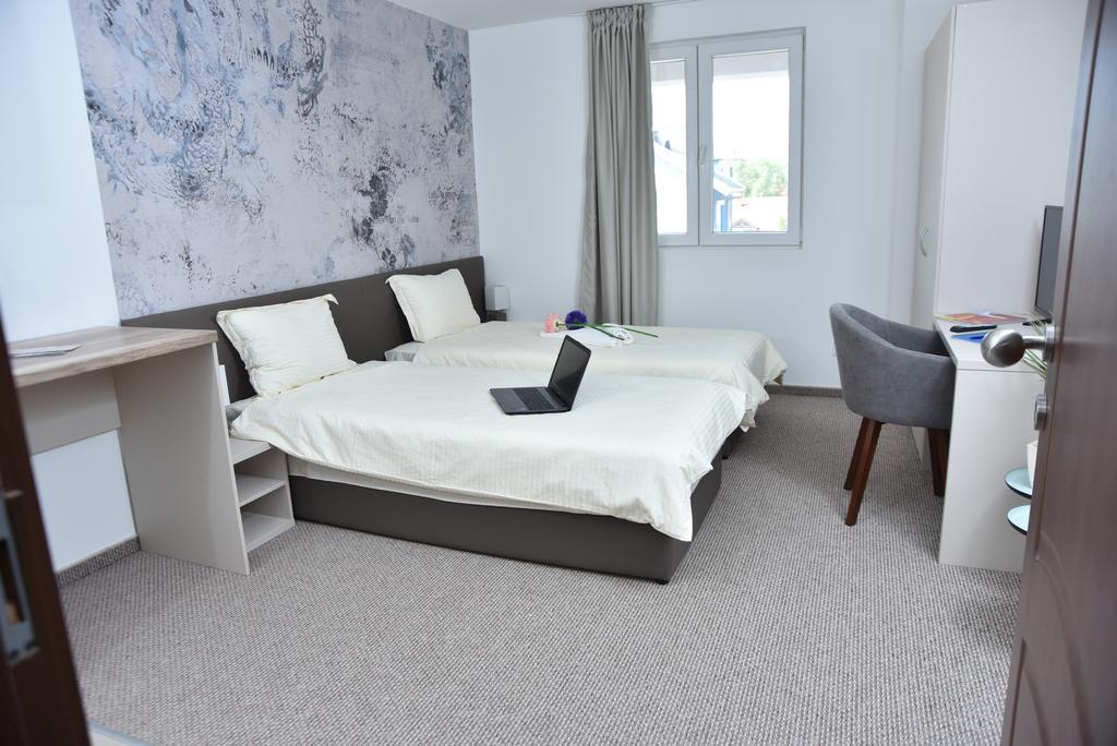 Kozle City Apartments Escópia Quarto foto